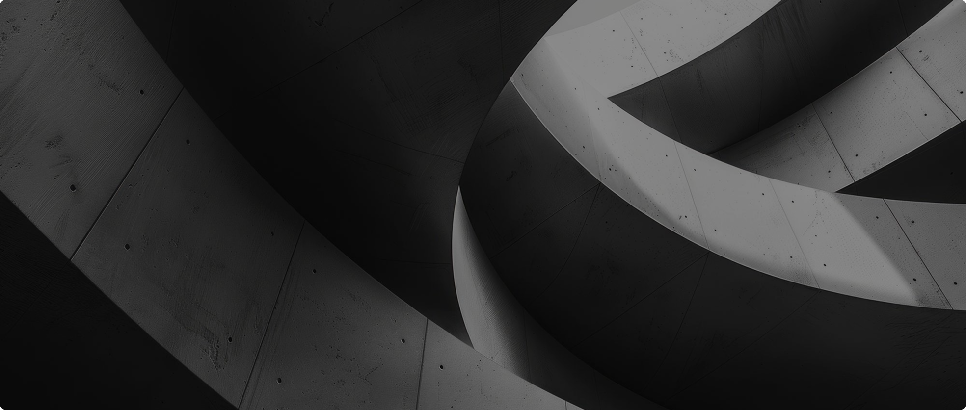 Close-up view of abstract curved concrete architectural forms with smooth surfaces and patterns of dots and lines in grayscale.